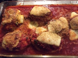 Chicken pieces with sauce and cheese- ready to be served!