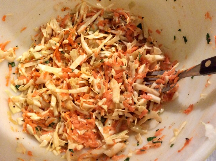 Chopped cabbage and carrot slaw with a tangy lime-based dressing