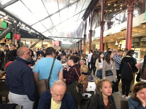 People at a crowded market in Florence